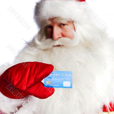 Traditional Santa Claus holding and sowing credit card while giv