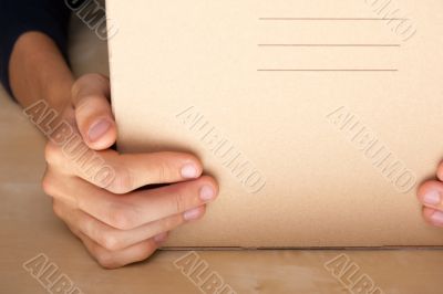 Successful Postal or delivery service concept. Man holding cardb