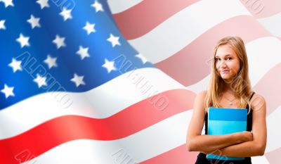 Portrait of pretty young woman holding book in her arms. USA Fla