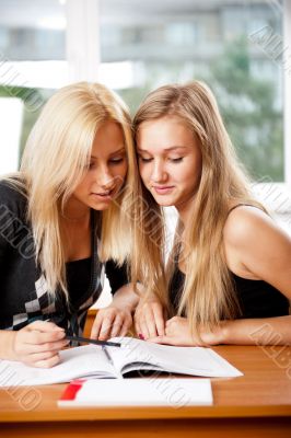 Portrait of a young group of students paying attention in class.