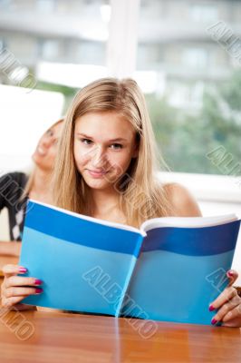Portrait of a young group of students paying attention in class.