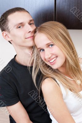 Portrait of a cute young couple enjoying themselves while prepar