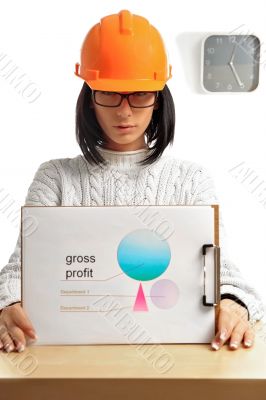 Young architect-woman wearing a protective helmet