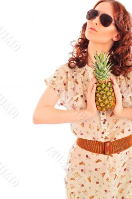 Closeup portrait of daydreaming woman holding pineapple fruit we Closeup portrait of daydreaming woman holding pineapple fruit we