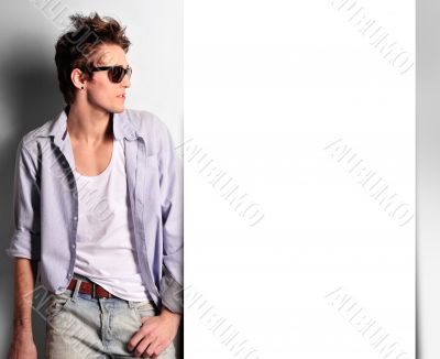 young, handsome man thinking