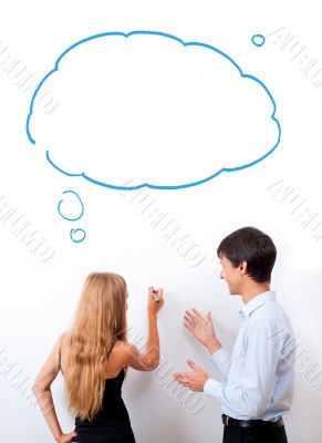Confident adult teacher helping to students in school classroom Confident adult teacher helping to students in school classroom