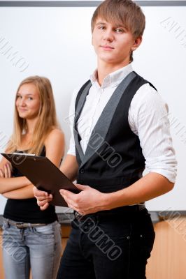 Portrait of college students making presentation of their projec