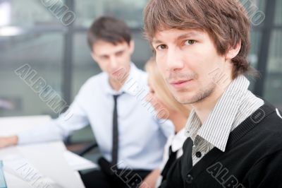 Two contemporary business people at a meeting