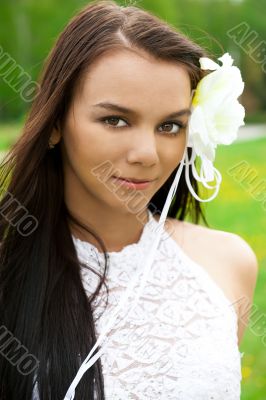 Closeup portrait of a beautiful smiling young woman