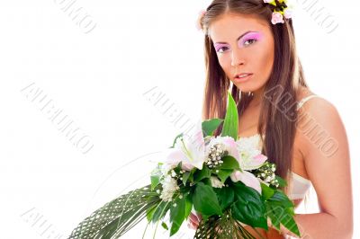 Closeup portrait of beautiful young woman wearing veil and weddi