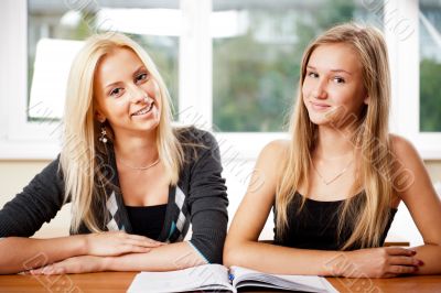 Portrait of a young group of students paying attention in class.
