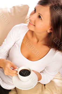 Closeup portrait of beautiful caucasian woman sitting on comfort