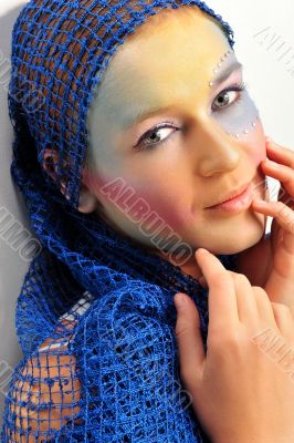 Closeup fashion portrait of cute woman with colorful bright make