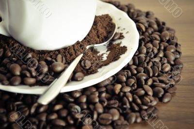 warm cup of coffee on brown background