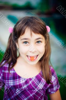 Artistic lifestyle photo of cute little girl outdoor at summer p