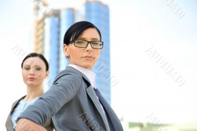 Portrait of a beautiful business woman with a female colleague