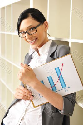 Portrait of a beautiful young woman with statistics.