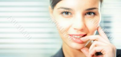 Closeup portrait of cute young business woman smiling