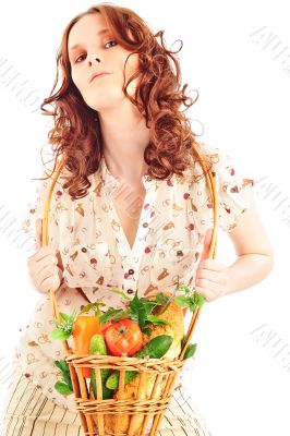 Closeup portrait of young caucasian woman with straw basket of f