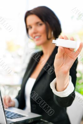 Young business woman using wireless internet connection with 3g 