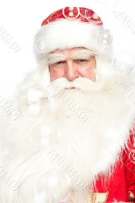 Santa Claus portrait smiling isolated over a white background an