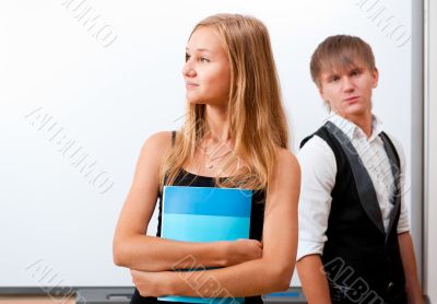 Portrait of college students making presentation of their projec