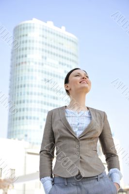 Portrait of a beautiful young businesswoman outside.
