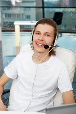 Closeup of smiling customer service executive or student with he