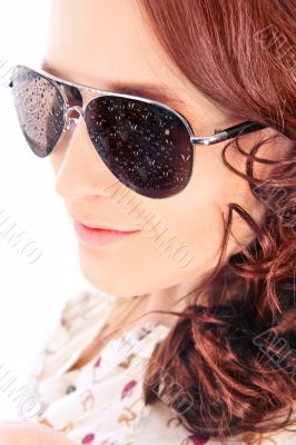Closeup portrait of beautiful fashion woman wearing sunglasses o