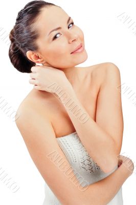 Beautiful European young woman standing with hands folded agains