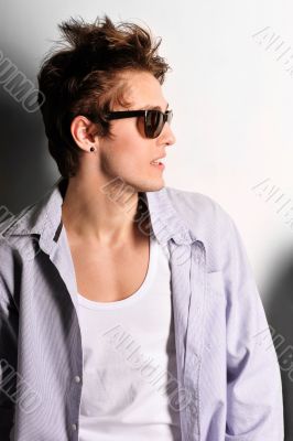 young, handsome man thinking