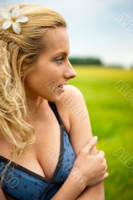 A portrait of a beautiful young Caucasian woman outdoor