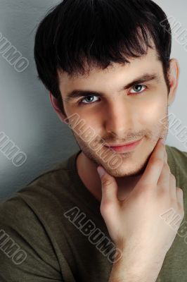 Closeup fashion portrait of young sexy man 