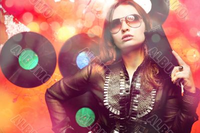 Portrait of a bright beautiful young woman with fashion sunglass