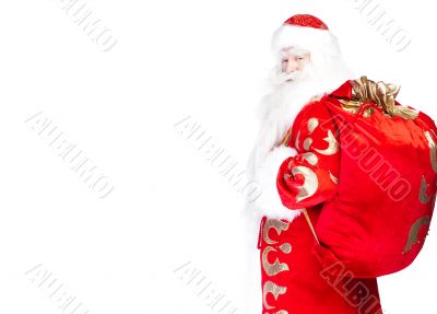 Santa Claus standing up on white background with his bag full of