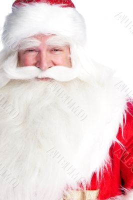 Santa Claus portrait smiling isolated over a white background
