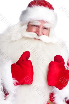Traditional Santa Claus thumbs up. Isolated on white.