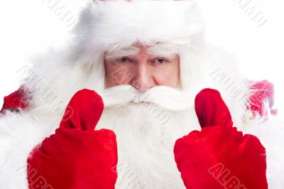 Traditional Santa Claus thumbs up. Isolated on white.