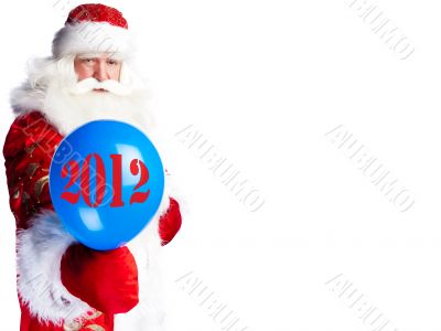 Traditional Santa Claus holding balloons for children. Isolated 