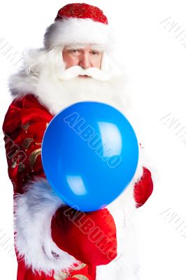 Traditional Santa Claus holding balloons for children. Isolated 