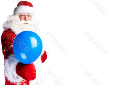 Traditional Santa Claus holding balloons for children. Isolated 