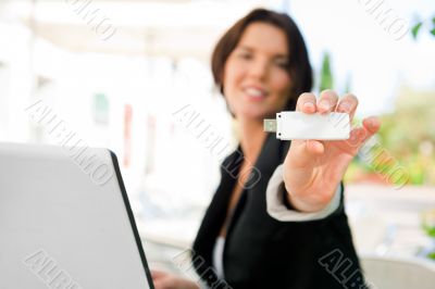 Young business woman using wireless internet connection with 3g 