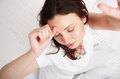 Portrait of a charming young lady relaxing on couch