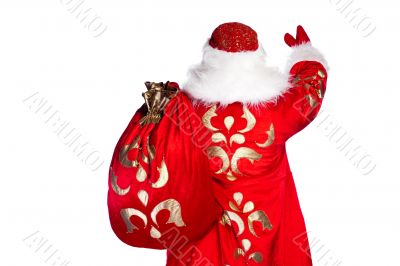 Santa Claus standing up on white background with his bag full of