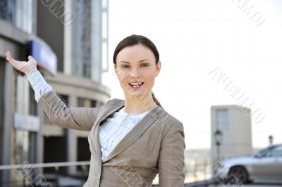 Portrait of a beautiful young businesswoman outside.