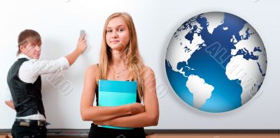 Portrait of two students making presentation in glassroom near w