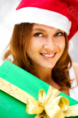 Portrait of young excited pretty woman standing inside shopping 