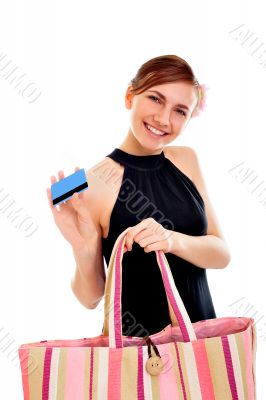 Portrait of a happy young woman woman with her handbag