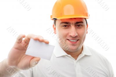 Closeup portrait of adult engineer man holding blank business ca
