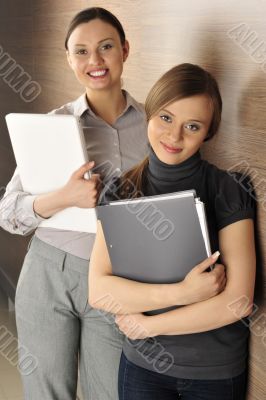 Portrait of two women in the hall.